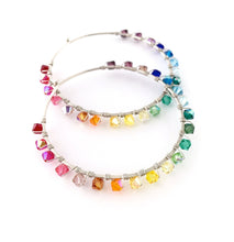 Load image into Gallery viewer, Rainbow Hoop Earrings. 2.5 inch Sterling Silver Swarovski Crystal Rainbow Hoops. Hand Hammered Shiny Large Sterling Silver Hoops
