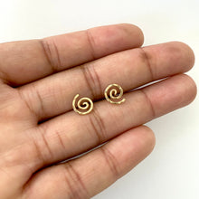 Load image into Gallery viewer, Gold Spiral Stud Earrings. Swirl Stud Post Earrings. 14k Gold Round Flat Hammered Stud Earrings. Yellow Gold Studs. Aziza Jewelry

