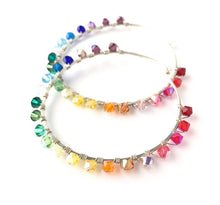 Load image into Gallery viewer, Rainbow Hoop Earrings. 2.5 inch Sterling Silver Swarovski Crystal Rainbow Hoops. Hand Hammered Shiny Large Sterling Silver Hoops
