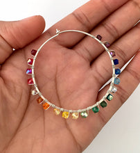 Load image into Gallery viewer, Rainbow Hoop Earrings. 2.5 inch Sterling Silver Swarovski Crystal Rainbow Hoops. Hand Hammered Shiny Large Sterling Silver Hoops
