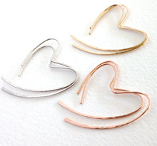 Load image into Gallery viewer, Gold Heart Earrings. 14k gold heart hoop earrings. 14k Solid Gold Hammered Heart Earrings. Yellow Gold Hoop Earrings. 1.75 inches long
