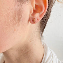 Load image into Gallery viewer, Gold Initial Earrings. 14k gold filled Small Dainty lowercase script earrings. Gold Letter Wire Studs. Aziza Jewelry
