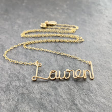Load and play video in Gallery viewer, 14k Gold Filled Name Necklace. Personalized Gold Name Necklace. Custom Script Name Necklace. Calligraphy Name Necklace. Aziza Jewelry
