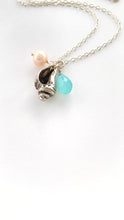 Load and play video in Gallery viewer, Conch Shell Necklace. Sterling Silver Ocean Charm Whelk Necklace
