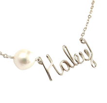 Load image into Gallery viewer, Pearl Name Necklace. Sterling Silver Name Necklace with Off White or Light Pink Freshwater Pearl. Custom Name Necklace w Large Real Pearl
