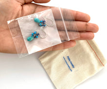 Load image into Gallery viewer, Jewelry Care- 40 Rubber Earring Backs and 40 Poly bags for Tarnish Free Earrings. Includes Cotton Pouch.
