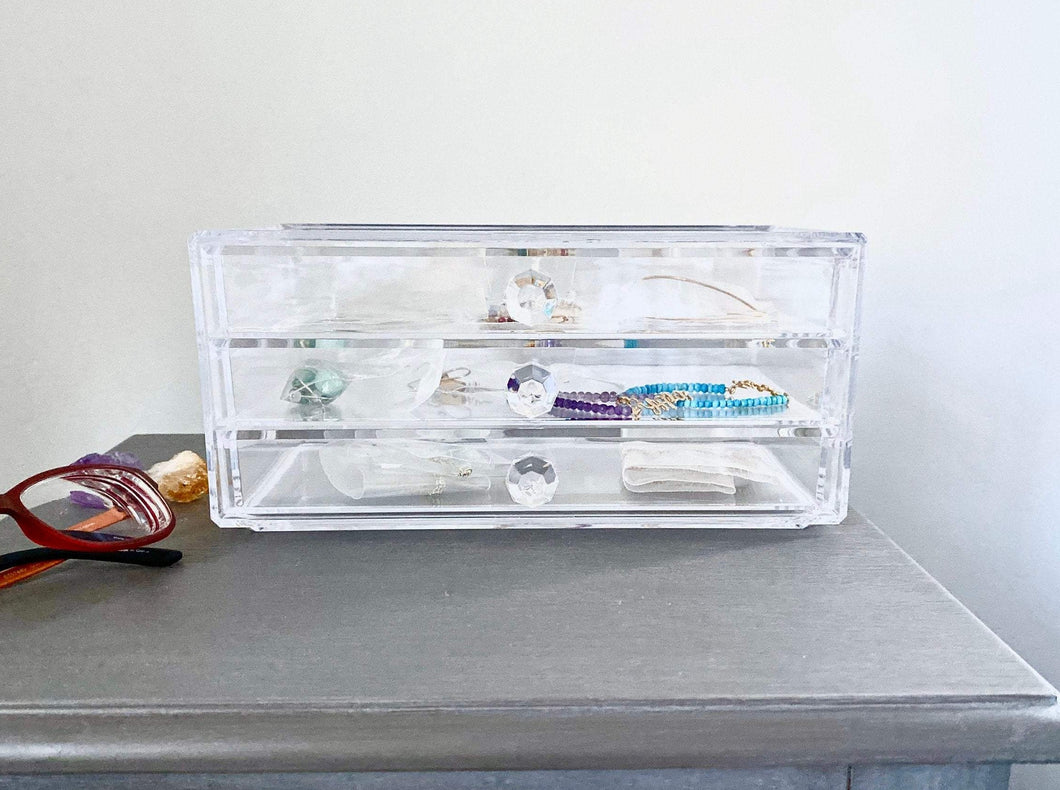 Acrylic Jewelry Storage Box with Cloth Pouch Poly bags and Rubber Ear backs. Acrylic Clear Jewelry Box with Aziza Jewelry Cotton Muslin Pouch, Rubber Ear backs and polybags.