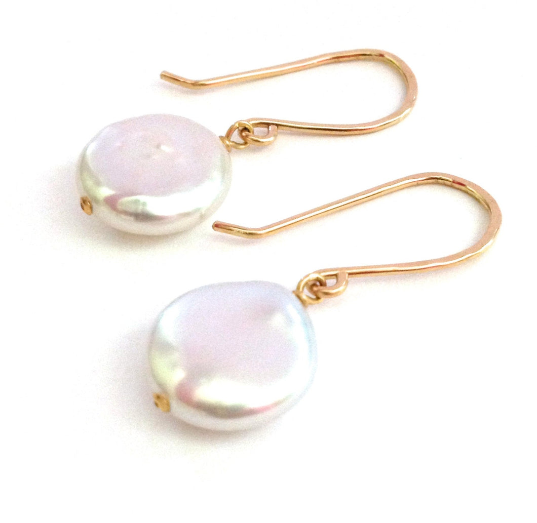 White Pearl Earrings. White coin pearl earrings with gold ear wires.